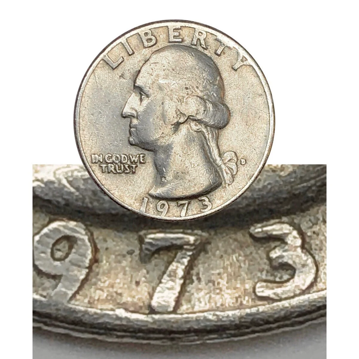 1973 quarter doubled die error close-up showing rounded doubling on LIBERTY lettering